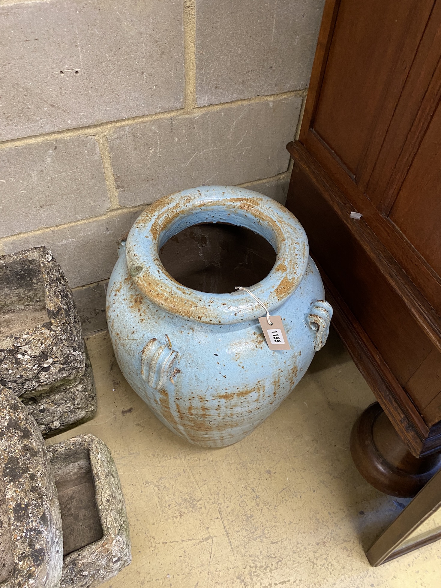 A blue glazed pottery garden urn, height 66cm